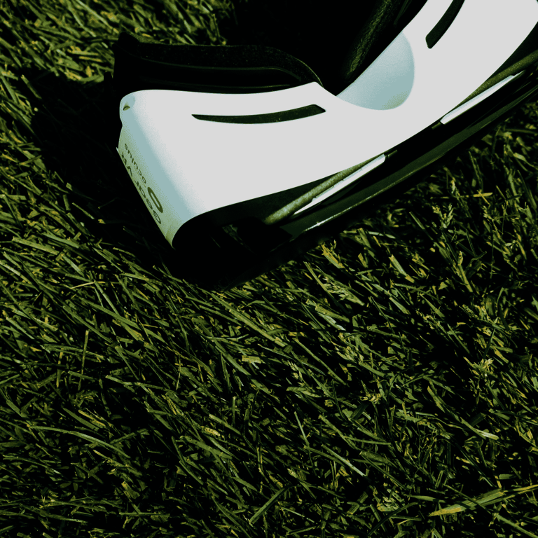 VR headset lies on grass