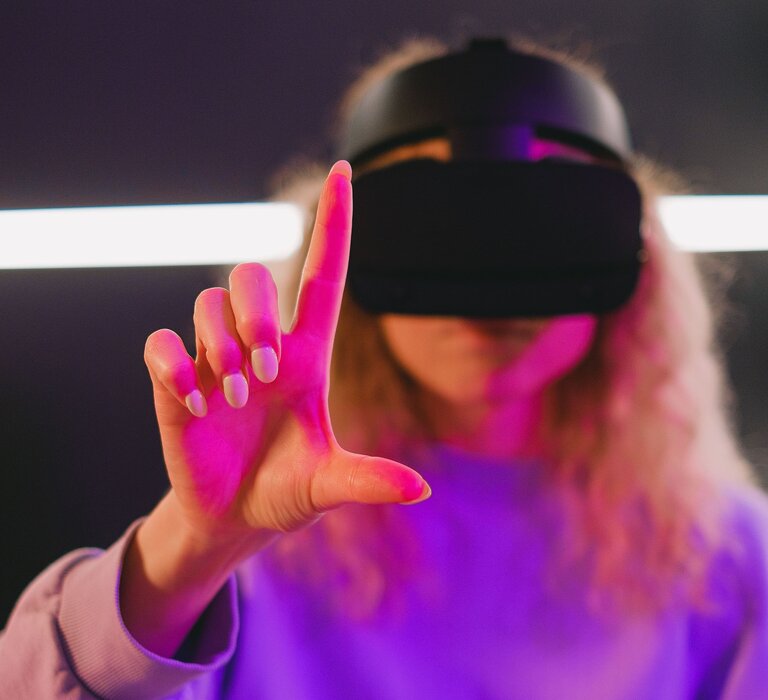  Person with VR headset drawing in the air