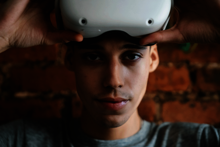  Man with VR headset pushed up