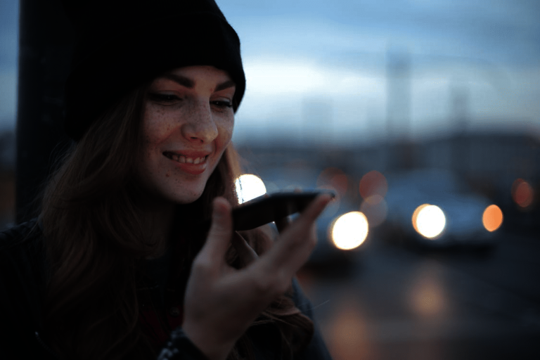 Woman-with-cell-phone Woman holding a cell phone